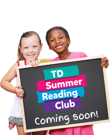 Two young girls holding up a blackboard that reads, "TD Summer Reading Club. Coming soon!"